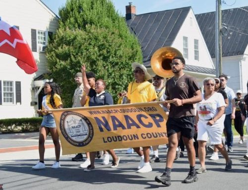 SMM chapter marches with NAACP and gives away 500 books to children to celebrate Juneteenth